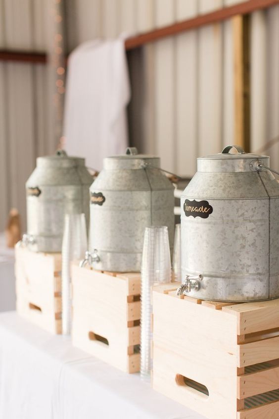 galvanized drink dispensers on crates