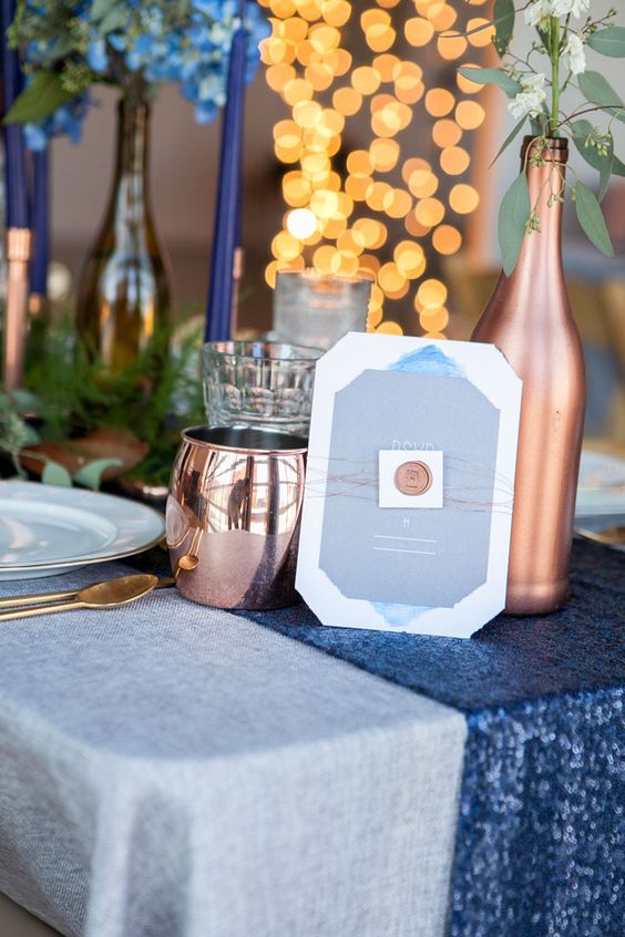 copper and dusty blues wedding centerpiece