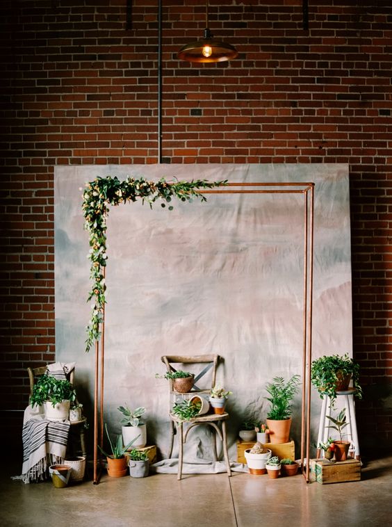 copper and greenery wedding arch