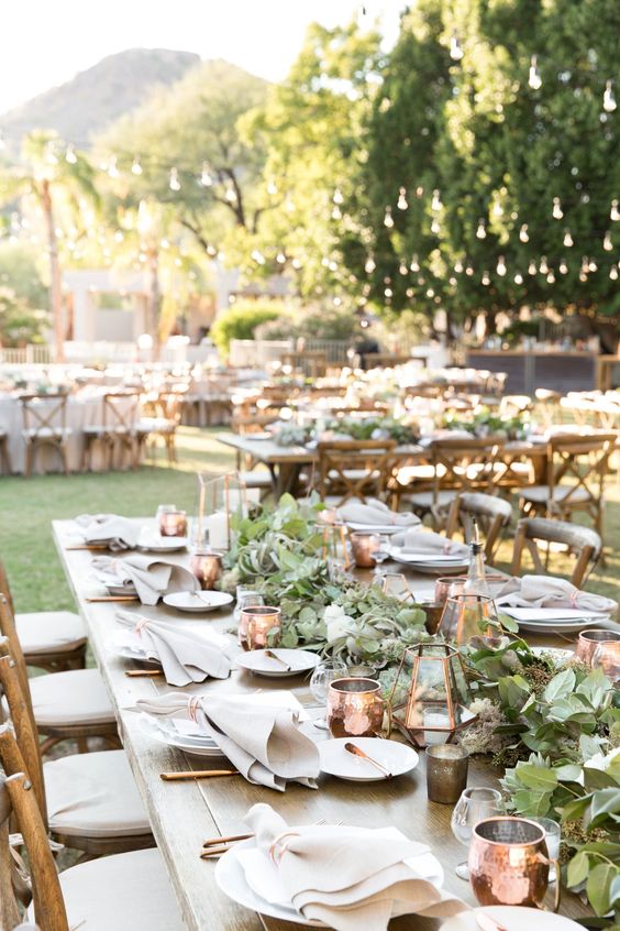 copper and greenery wedding reception decor