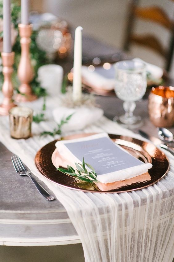 copper and greenery winter wedding table idea