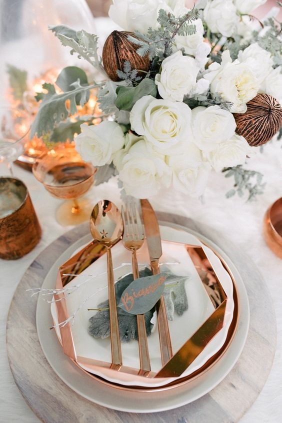 copper and greenry wedding reception decor