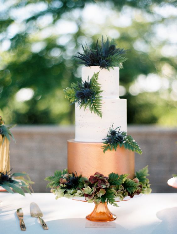 greenery and copper wedding cake