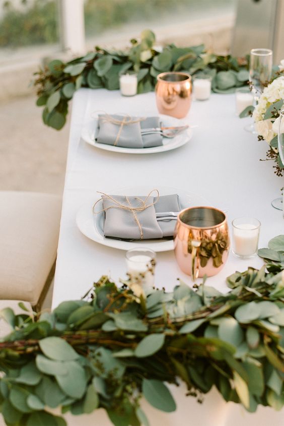 greenery and copper wedding table