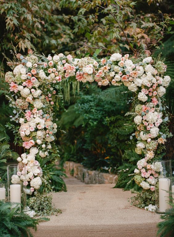 Floral rose and hydrangea wedding arch