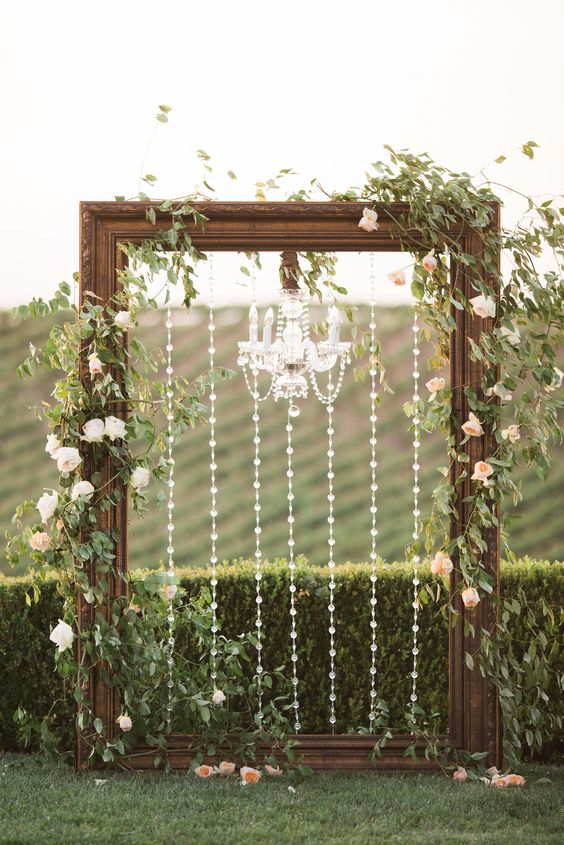 Frame & chandelier wedding arch