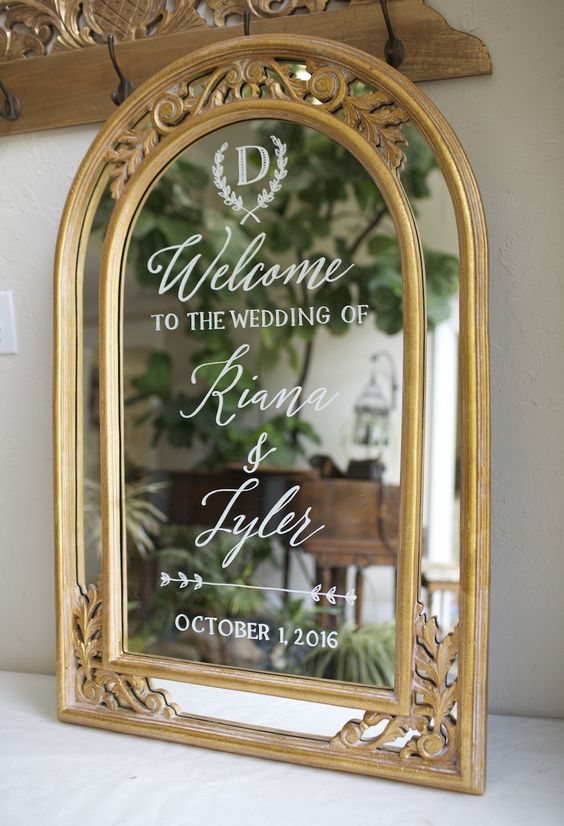 Gold ornate framed wedding welcome with custom monogram