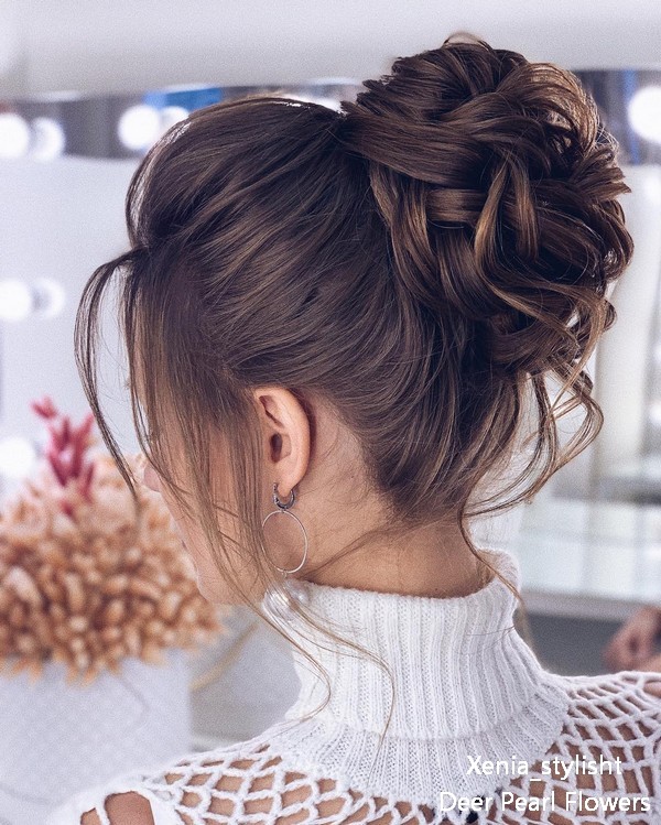 Long curly high bun culry wedding guest updos 