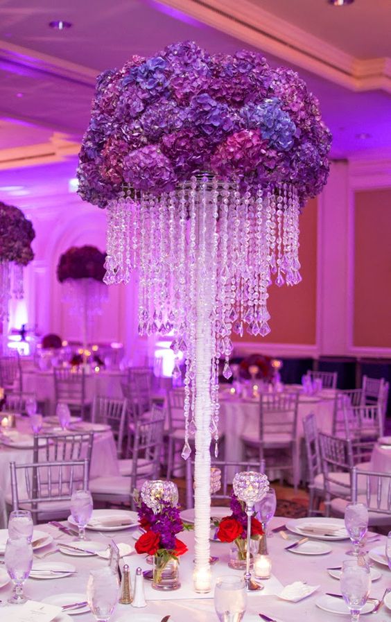Purple hydrangeas and hanging crystals wedding centerpiece