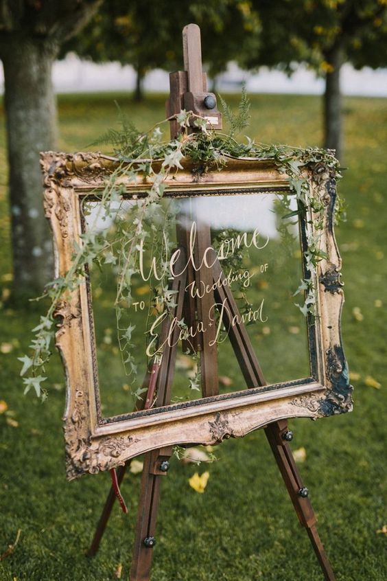 Welcome wedding sign on glass in gold frame