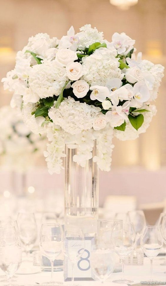 White Winter wedding flowers centerpieces