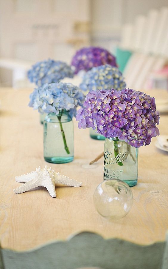 blue and purple hydrangeas beach wedding centerpiece