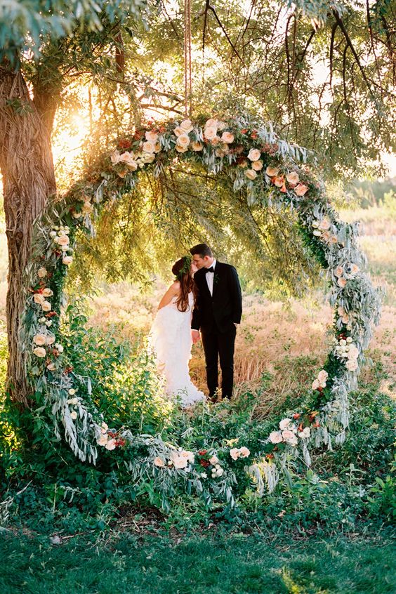 peach and greenery wedding backdrop