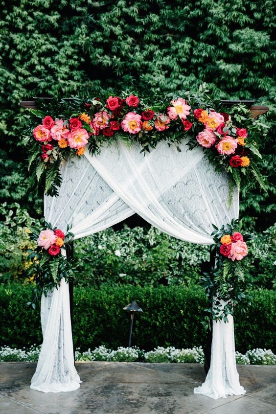 peony and greenery floral wedding arch