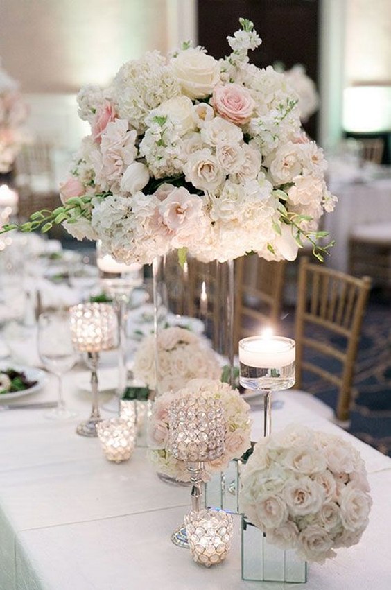 roses, hydrangeas, and peonies tall wedding centerpiece