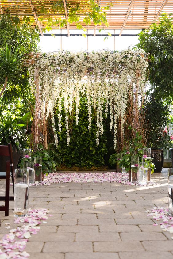 rustic white flowers wedding arch