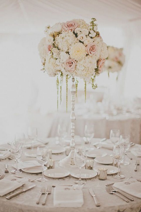 white and blush tall wedding centerpiece