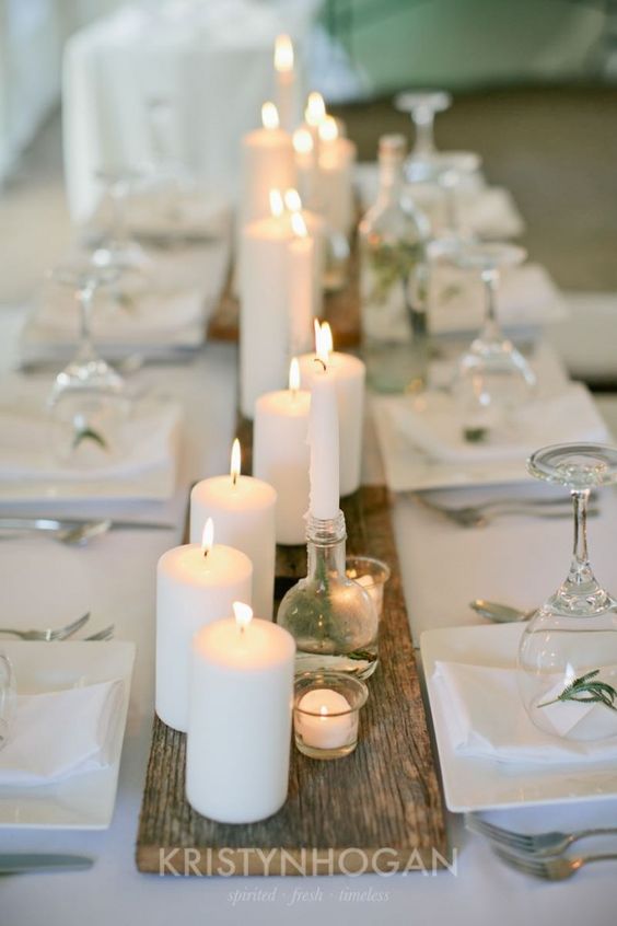white candles on barn wood wedding centerpiece