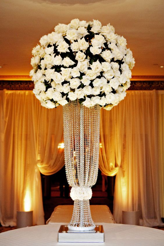 white roses tall wedding centerpiece