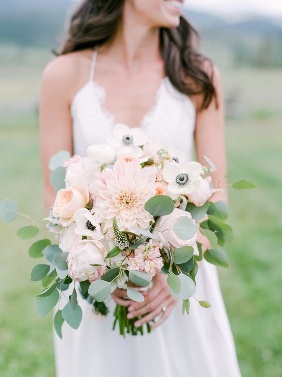 Anemone, chrysanthemum, peony, and eucalyptus wedding bouquet