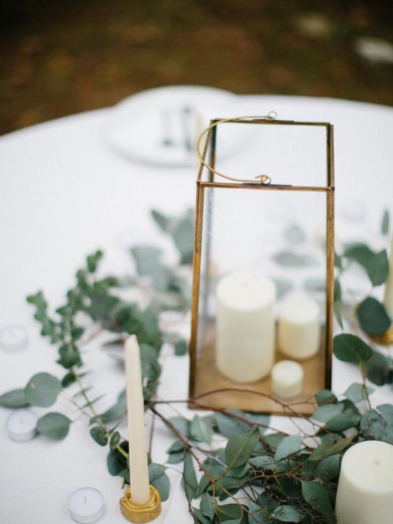 lantern and eucalyptus wedding centerpiece