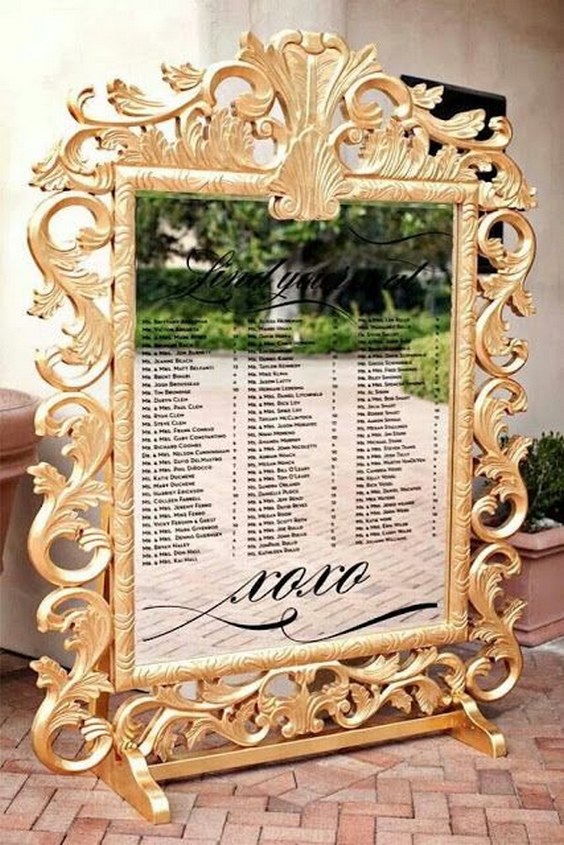 vintage gold baroque mirror wedding seating chart idea