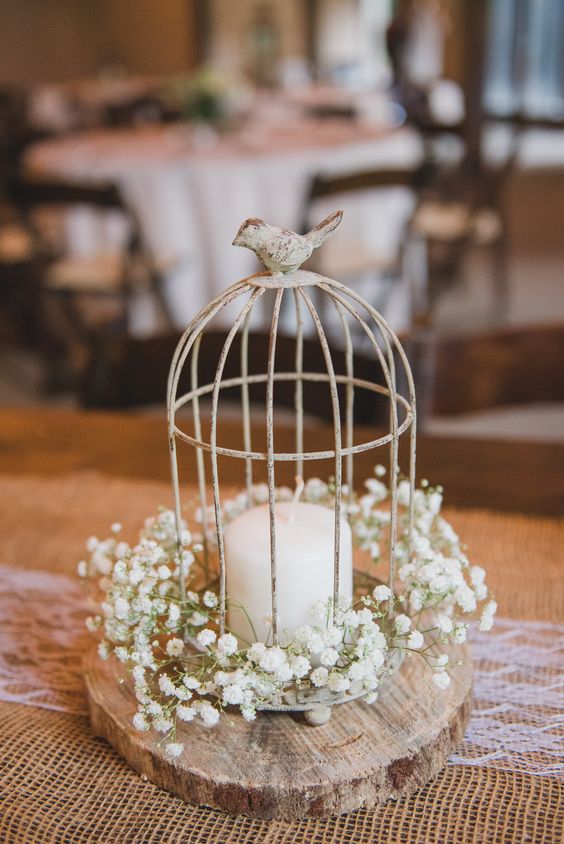 Birdcage, candle, babys breath rustic centerpiece