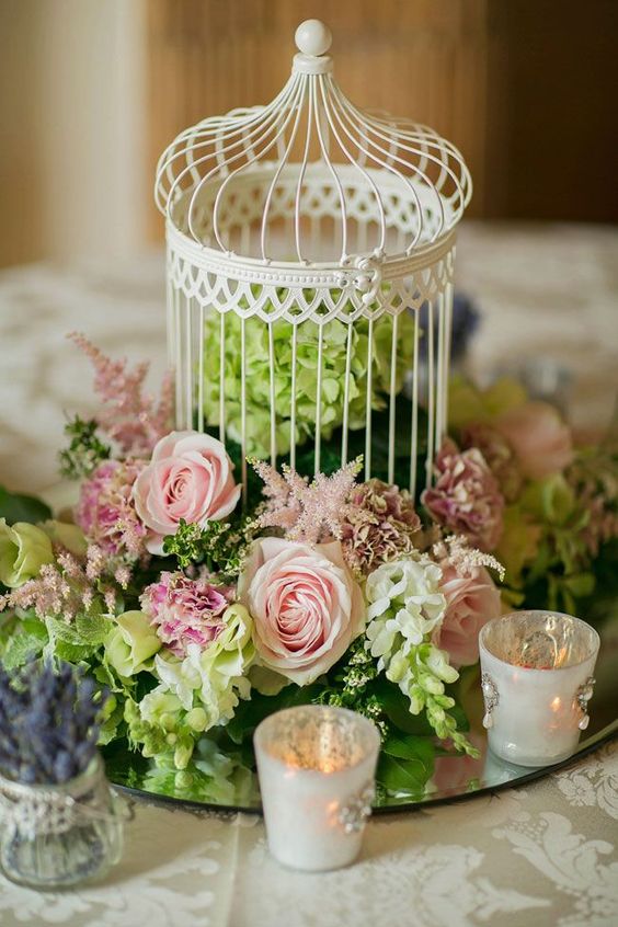 Shabby chic birdcage and pink roses green hydrangeas wedding centerpiece