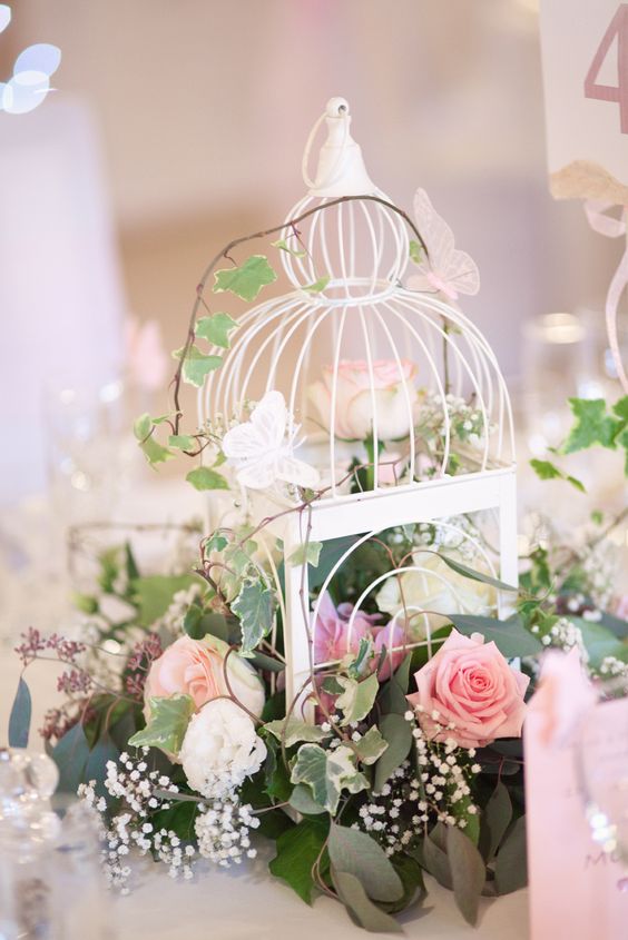 Shabby chic vintage birdcage wedding centre piece