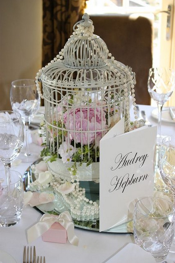 Wedding Flowers arranged in Vintage Birdcages