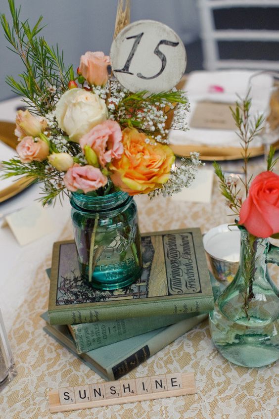 vintage mason jar and books wedding centerpiece