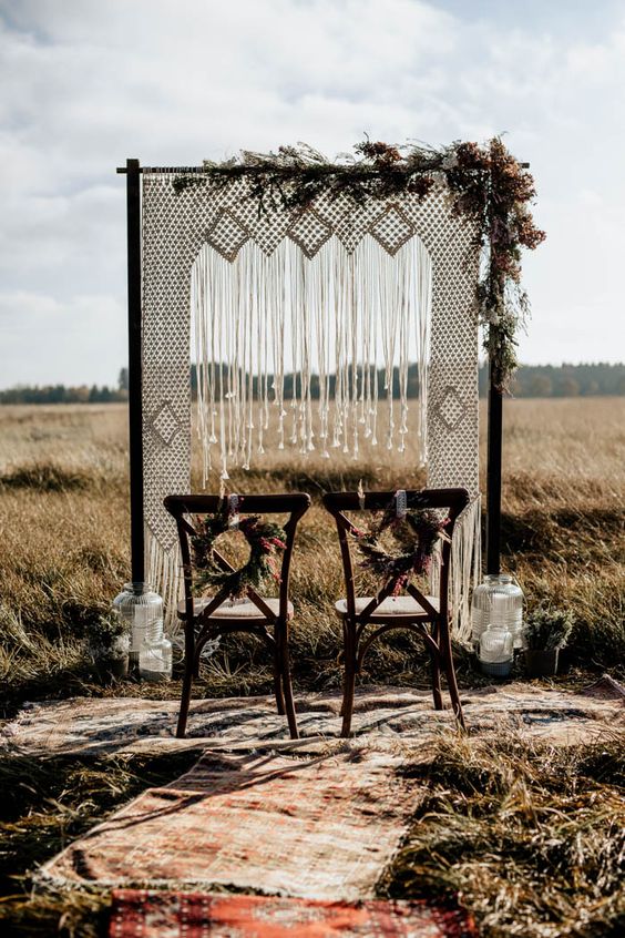 Stunning macrame arch with floral accents