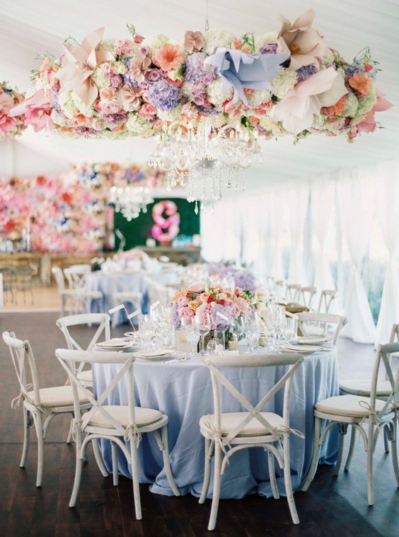 pastel flowers and dusty blue wedding table decor