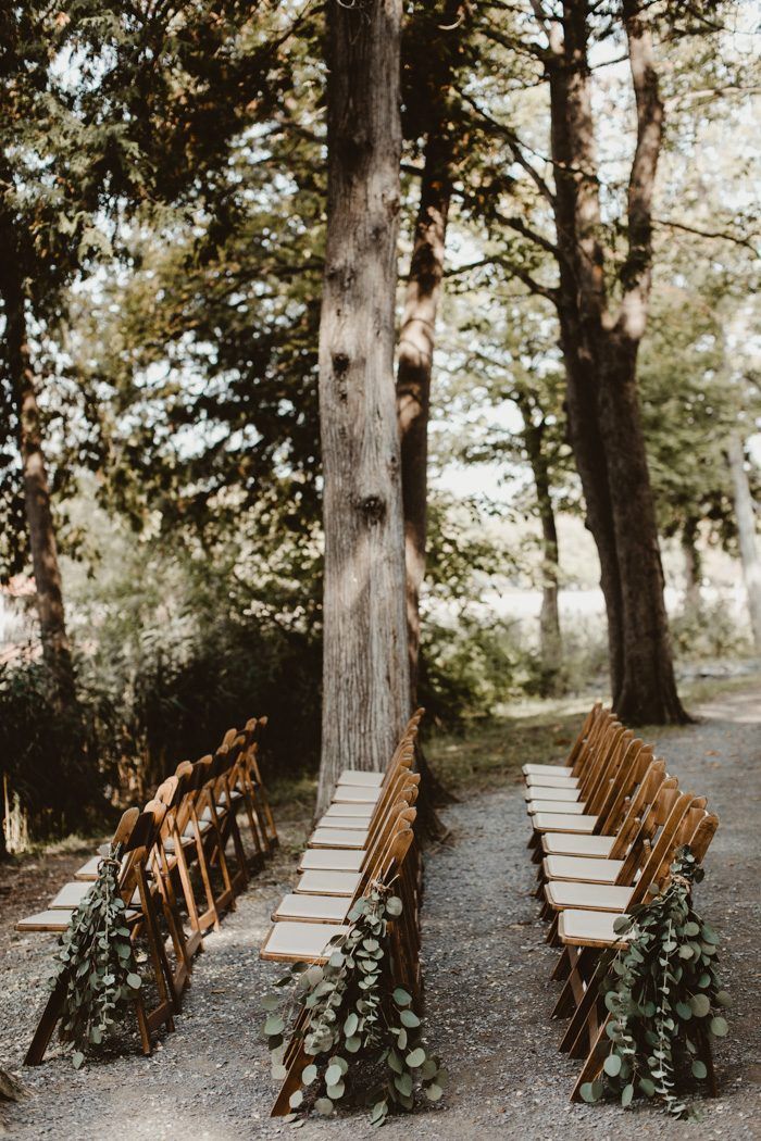 Draped greenery is a simple wedding aisle maker that also makes a statement
