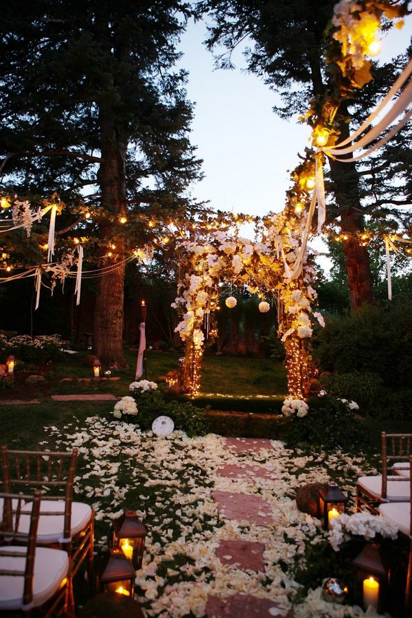 Rustic boho outdoor forest woodland twilight wedding ceremony decor