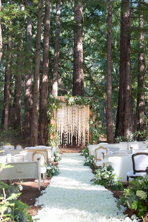 Rustic boho outdoor forest woodland wedding ceremony decor