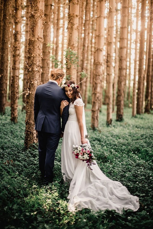 woodland boho wedding with bride wearing Grace Loves Lace dress and flower crown