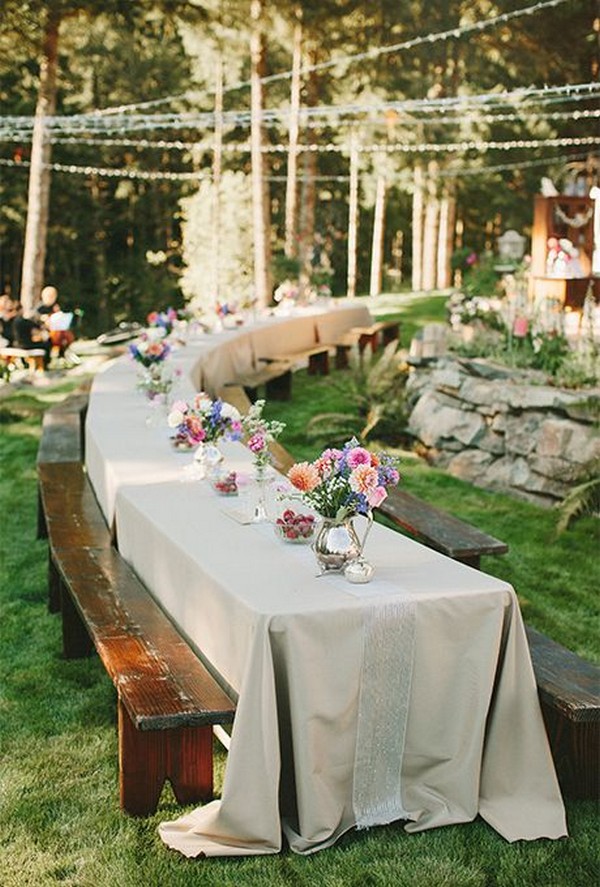 long table wedding reception in the forest