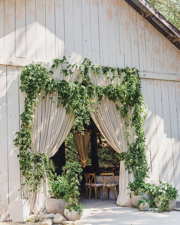 Greenery barn wedding entrance decor 3