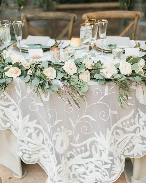 Vintage greenery and white roses wedding table decor 6