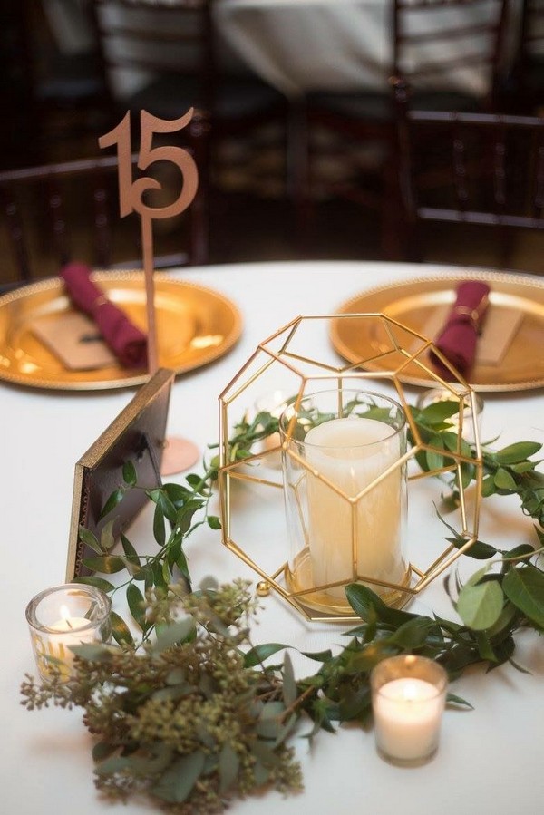 Geometric metallic table centerpiece greenery burgundy Marsala