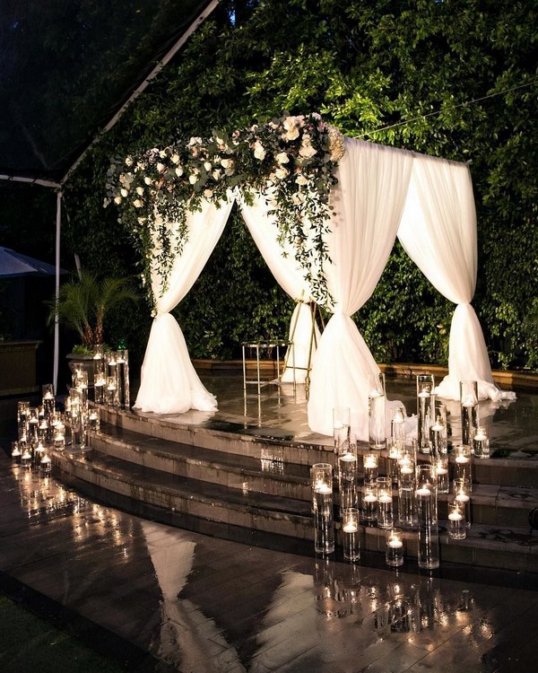 Rustic indoor candles and greenery wedding ceremony decor7