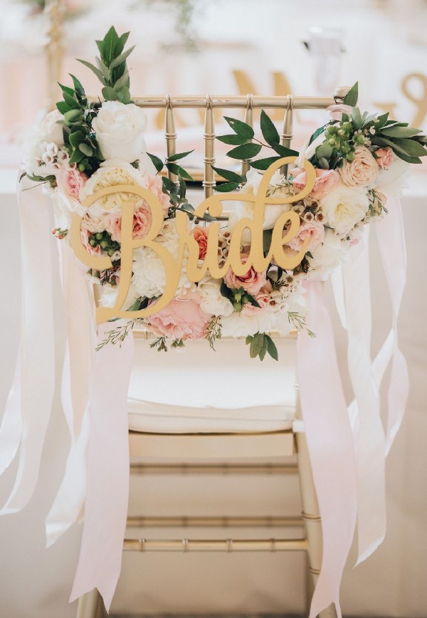 blush and greenery wedding chair decor