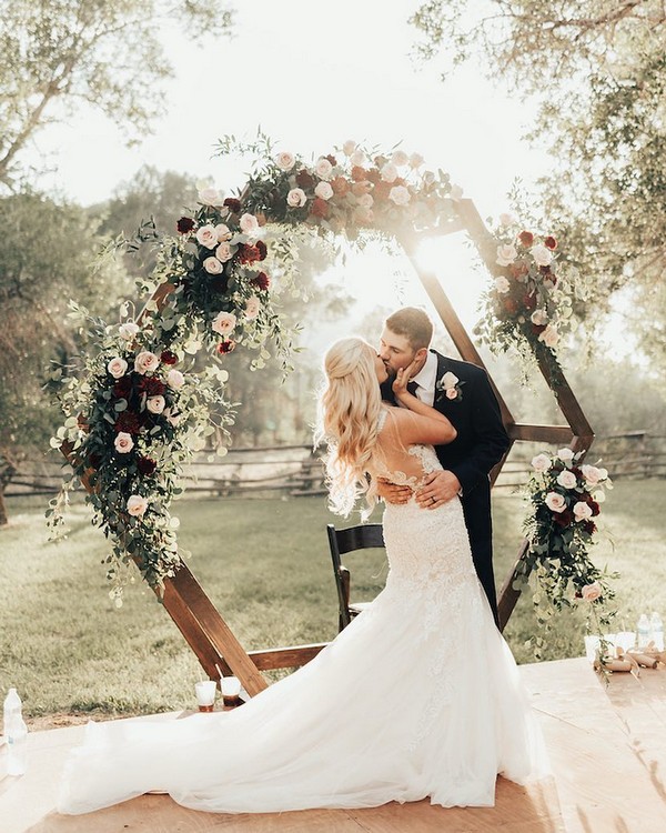 30 Burgundy and Blush Wedding Ideas & Colors 2024 30 blush burgundy and greenery wedding backdrop 15