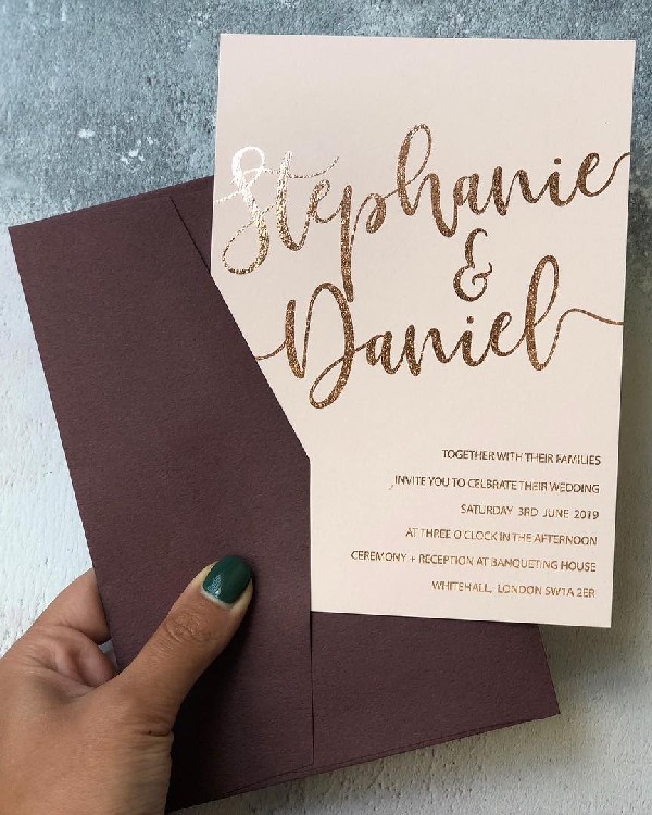 blush gold foil wedding invitation with burgundy envelope