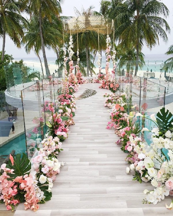 blush pink and greenery wedding arch