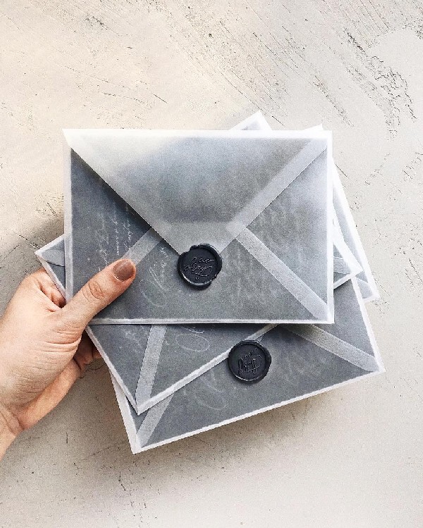 elegant black wedding invitation with vellum envelopes