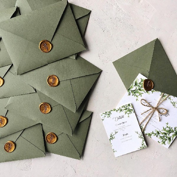 greenery wedding invitation with dark sage green envelope