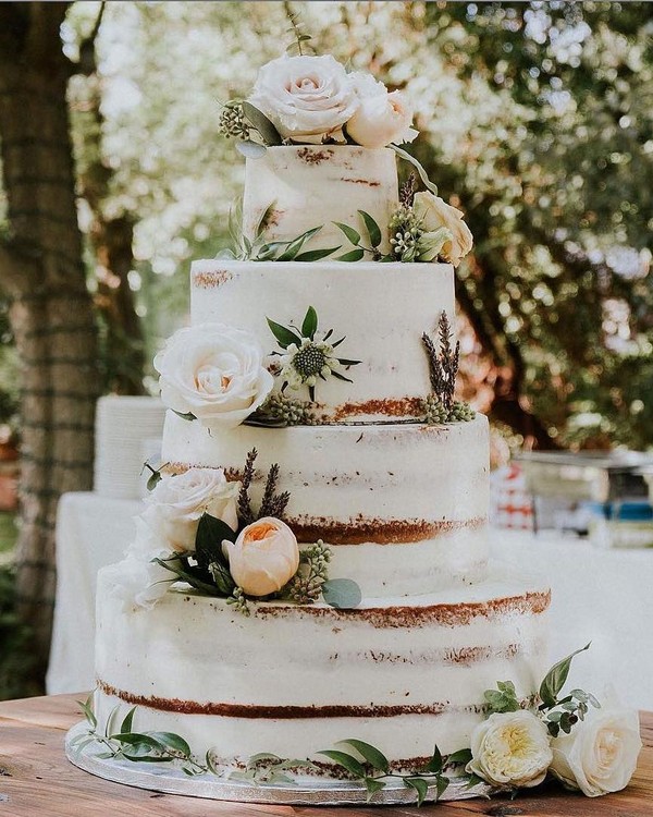 rustic naked wedding cake with ivory flowers 5