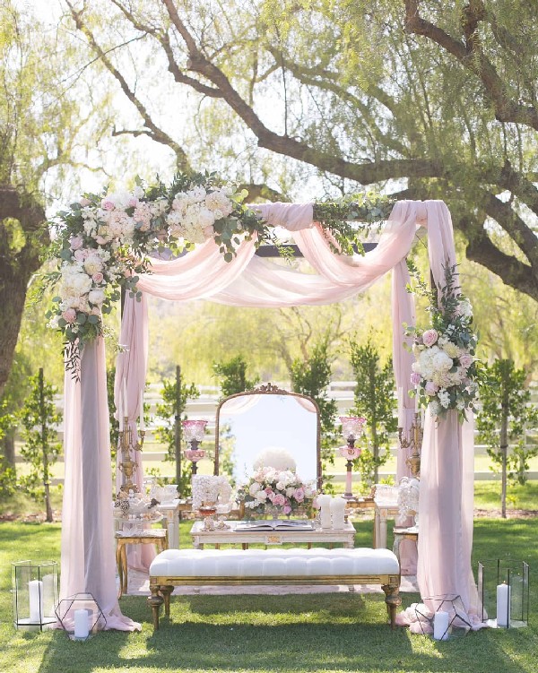 vintage blush pink and greenery droped fabric wedding arch